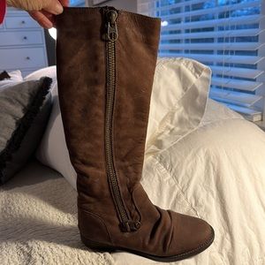 Soft brown leather boot with fun zipper.